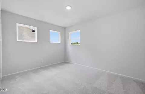 Bedroom - 1152 Lancashire Grove Pl, Willow Spring, NC 27592 photo 2 of 2