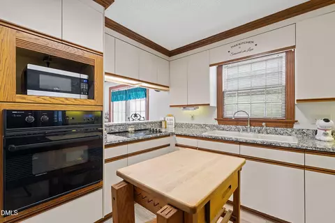 Kitchen - 6314 Old Davis Rd, Sims, NC 27880 photo 3 of 7