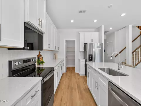 Kitchen - 140 Thistle Patch Pl, Angier, NC 27501 photo 3 of 4