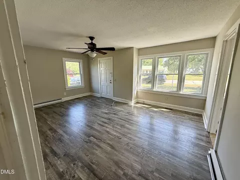 Living - 199 E Main St, Coats, NC 27521 photo 2 of 2