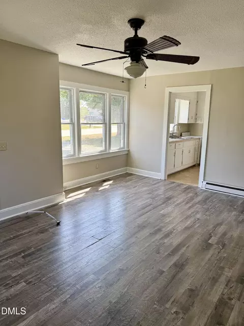Living - 199 E Main St, Coats, NC 27521 photo 1 of 2