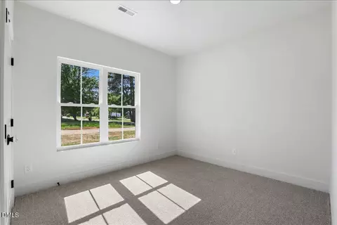 Bedroom - 204 W Wilson St, Micro, NC 27555 photo 3 of 6