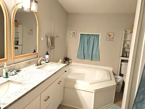 Bath - 87 E Williams St, Coats, NC 27521 photo 1 of 7