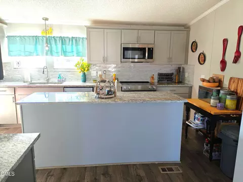 Kitchen - 87 E Williams St, Coats, NC 27521 photo 2 of 3