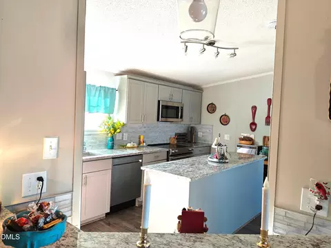 Kitchen - 87 E Williams St, Coats, NC 27521 photo 3 of 3