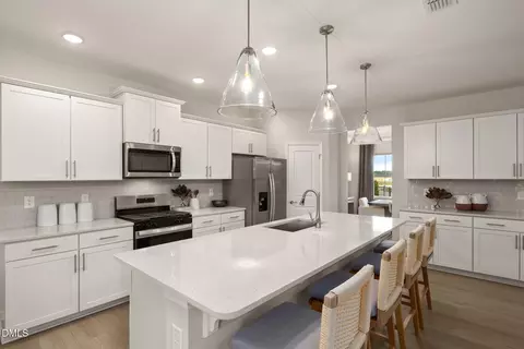 Kitchen - 208 Armorial Ct, Willow Spring, NC 27592 photo 3 of 4