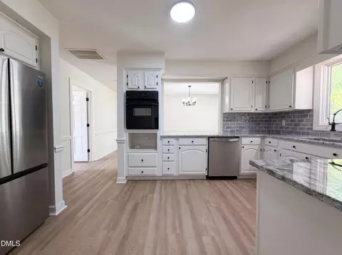 Kitchen - 108 Oak St, Pine Level, NC 27568 photo 3 of 4