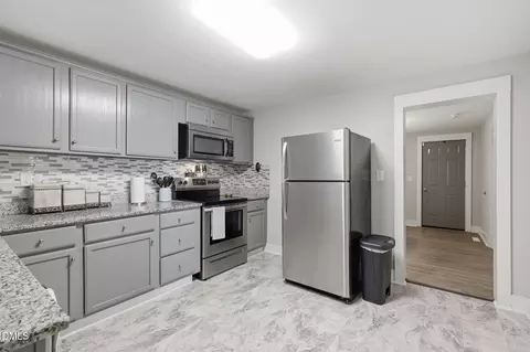 Kitchen - 607 E Holmes St, Benson, NC 27504 photo 2 of 4