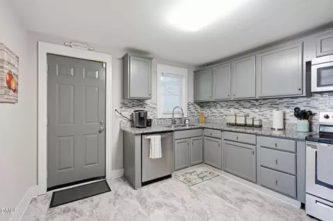 Kitchen - 607 E Holmes St, Benson, NC 27504 photo 1 of 4