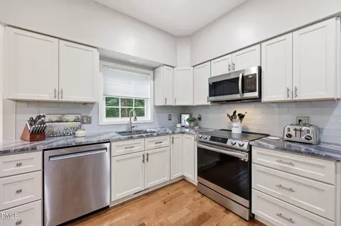 Kitchen - 211 Stablegate Dr, Cary, NC 27513 photo 2 of 2