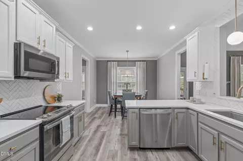 Kitchen - 2450 Rolling Tracks Rd, Willow Spring, NC 27592 photo 5 of 6