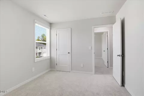 Bedroom - 1506 Hatteras Rd, Durham, NC 27703 photo 2 of 8