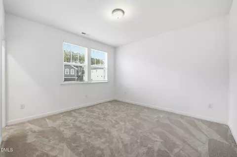 Bedroom - 1121 Manchaca Loop, Apex, NC 27539 photo 6 of 10