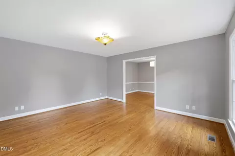 Living - 4818 Berini Dr, Durham, NC 27705 photo 4 of 5