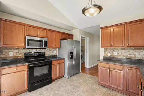 Kitchen - 39 Buckhaven Dr, Willow Spring, NC 27592 photo 2 of 3