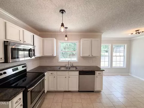 Kitchen - 1024 Laurel Leaf Rd, Zebulon, NC 27597 photo 2 of 2