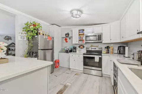 Kitchen - 3516 E Thollie Green Rd, Stem, NC 27581 photo 2 of 3