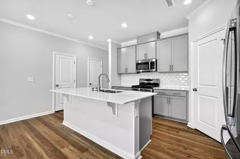 Kitchen - 324 Marmalade Sky Ln, Wake Forest, NC 27587 photo 6 of 6