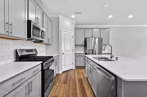 Kitchen - 324 Marmalade Sky Ln, Wake Forest, NC 27587 photo 5 of 6