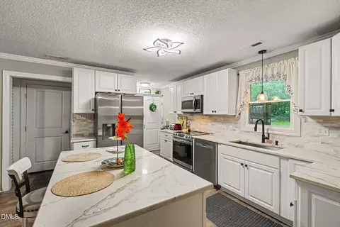 Kitchen - 211 Brookside Dr, Smithfield, NC 27577 photo 2 of 4