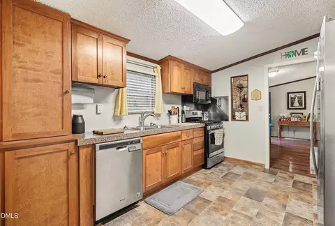 Kitchen - 169 Mount Pleasant Rd, Willow Spring, NC 27592 photo 2 of 3