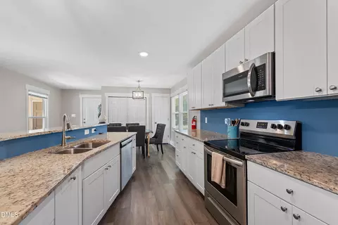 Kitchen - 1002 E Maplewood Dr, Benson, NC 27504 photo 3 of 8