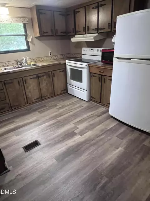 Kitchen - 197 E Holly Ln, Henderson, NC 27537 photo 2 of 3