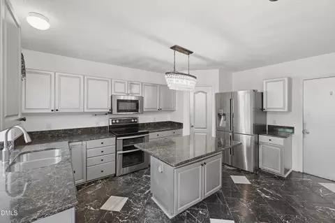 Kitchen - 111 Swordgate Dr, Cary, NC 27513 photo 3 of 3