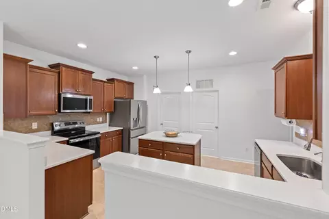 Kitchen - 817 Edgeware Way, Wake Forest, NC 27587 photo 2 of 9