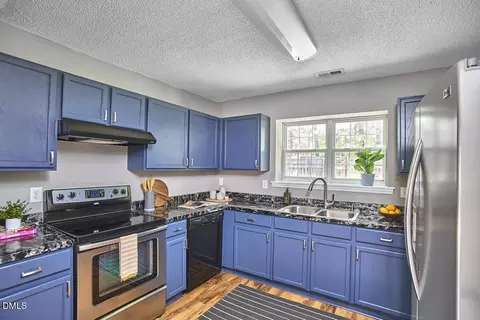 Kitchen - 628 Ashford Ln, Durham, NC 27713 photo 2 of 3