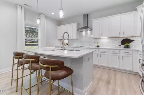 Kitchen - 1608 Osprey Ridge Dr, Willow Spring, NC 27592 photo 2 of 5