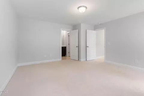 Bedroom - 1608 Osprey Ridge Dr, Willow Spring, NC 27592 photo 9 of 10