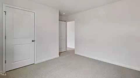 Bedroom - 713 Sparkling Pear Dr, Willow Spring, NC 27592 photo 9 of 11