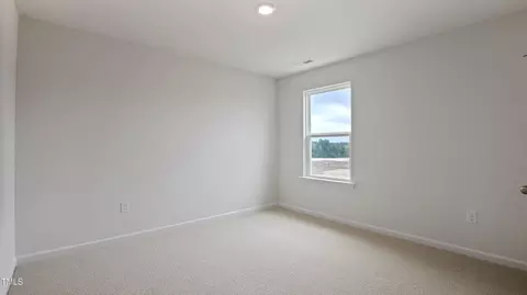 Bedroom - 713 Sparkling Pear Dr, Willow Spring, NC 27592 photo 8 of 11