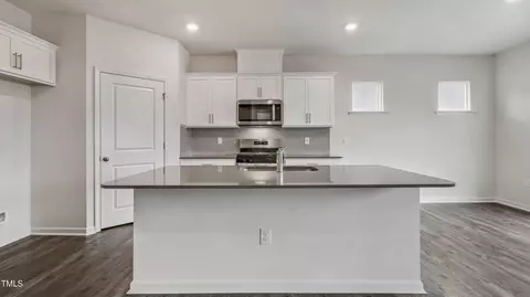 Kitchen - 713 Sparkling Pear Dr, Willow Spring, NC 27592 photo 2 of 5