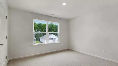 Bedroom - 713 Sparkling Pear Dr, Willow Spring, NC 27592 photo 11 of 11