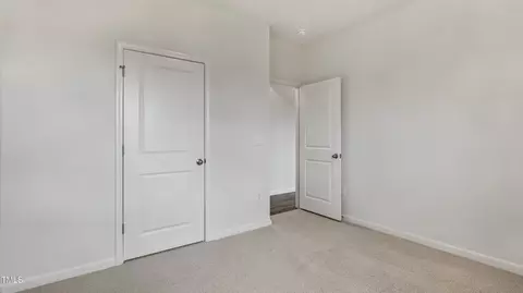 Bedroom - 713 Sparkling Pear Dr, Willow Spring, NC 27592 photo 4 of 11