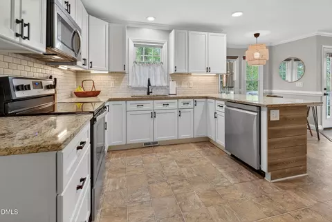 Kitchen - 956 E Durness Ct, Wake Forest, NC 27587 photo 3 of 7