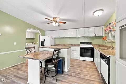 Kitchen - 13816 Labaron Dr, Willow Spring, NC 27592 photo 2 of 3