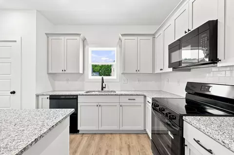 Kitchen - 16 Loganberry Ave, Bunnlevel, NC 28323 photo 4 of 4