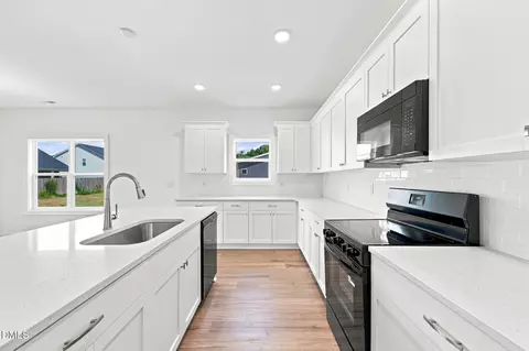 Kitchen - 30 Loganberry Ave, Bunnlevel, NC 28323 photo 2 of 4