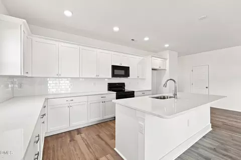 Kitchen - 30 Loganberry Ave, Bunnlevel, NC 28323 photo 3 of 4