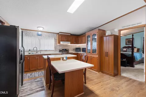 Kitchen - 7810 Mount Pleasant Rd, Willow Spring, NC 27592 photo 6 of 7