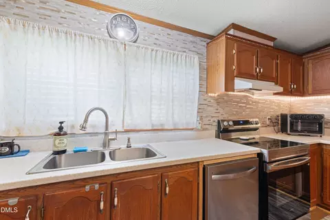 Kitchen - 7810 Mount Pleasant Rd, Willow Spring, NC 27592 photo 3 of 7