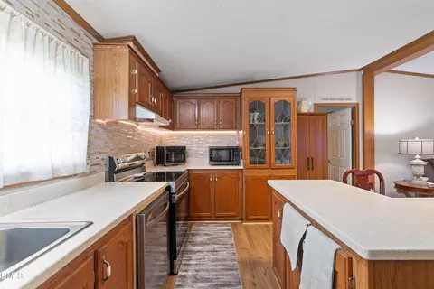 Kitchen - 7810 Mount Pleasant Rd, Willow Spring, NC 27592 photo 4 of 7