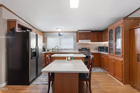 Kitchen - 7810 Mount Pleasant Rd, Willow Spring, NC 27592 photo 5 of 7
