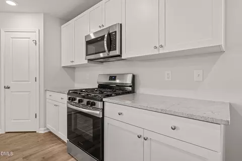Kitchen - 605 Spellbrook Rd, Zebulon, NC 27597 photo 4 of 5