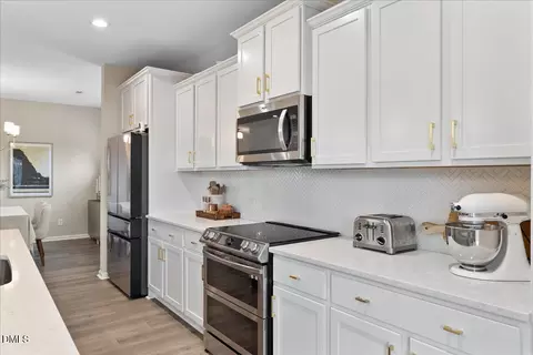 Kitchen - 1237 Huffington Oak Dr, Willow Spring, NC 27592 photo 3 of 3