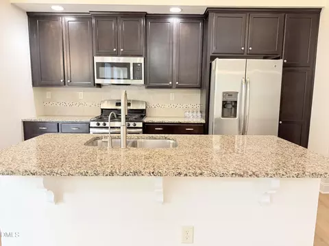Kitchen - 142 Skyros Loop, Cary, NC 27519 photo 2 of 2