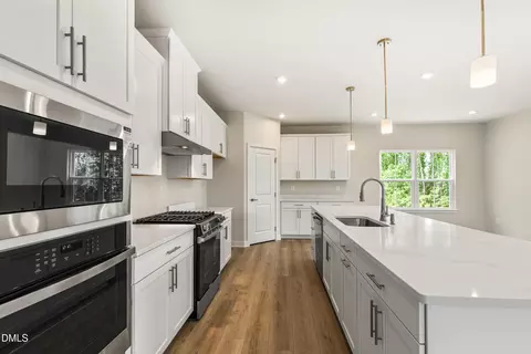 Kitchen - 857 Walker Ridge Way, Willow Spring, NC 27592 photo 4 of 5
